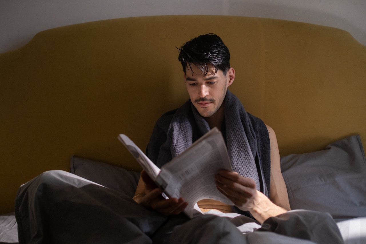 A man is reading for the bedtime routine